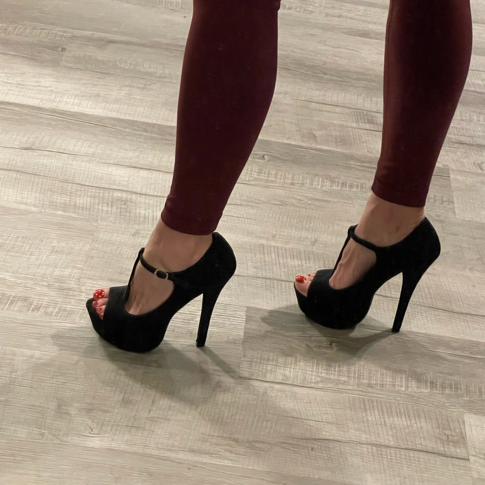 Black pumps with 5 1/2” heel. Worn once!